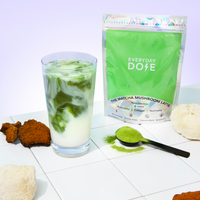10-Pack of Mushroom Matcha+ with matcha latte, functional mushrooms, collagen, and nootropics on white tile surface.